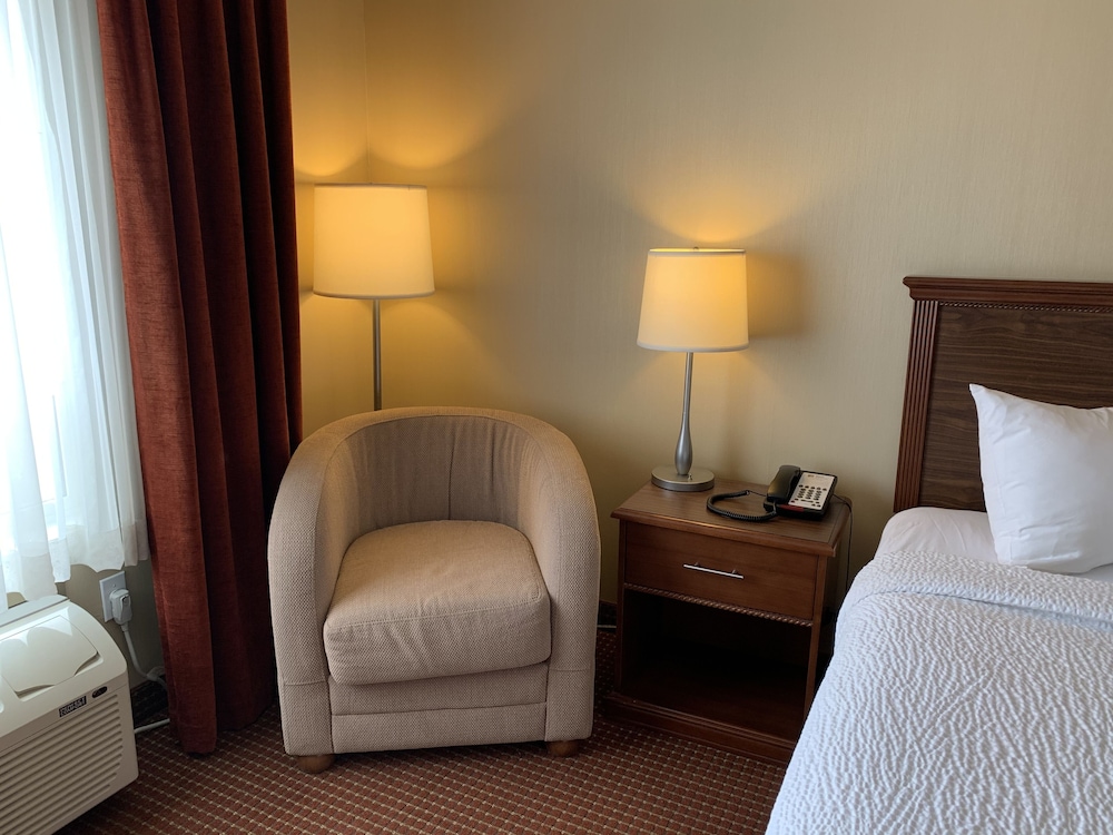 Merit Hotel And Suites 33/66