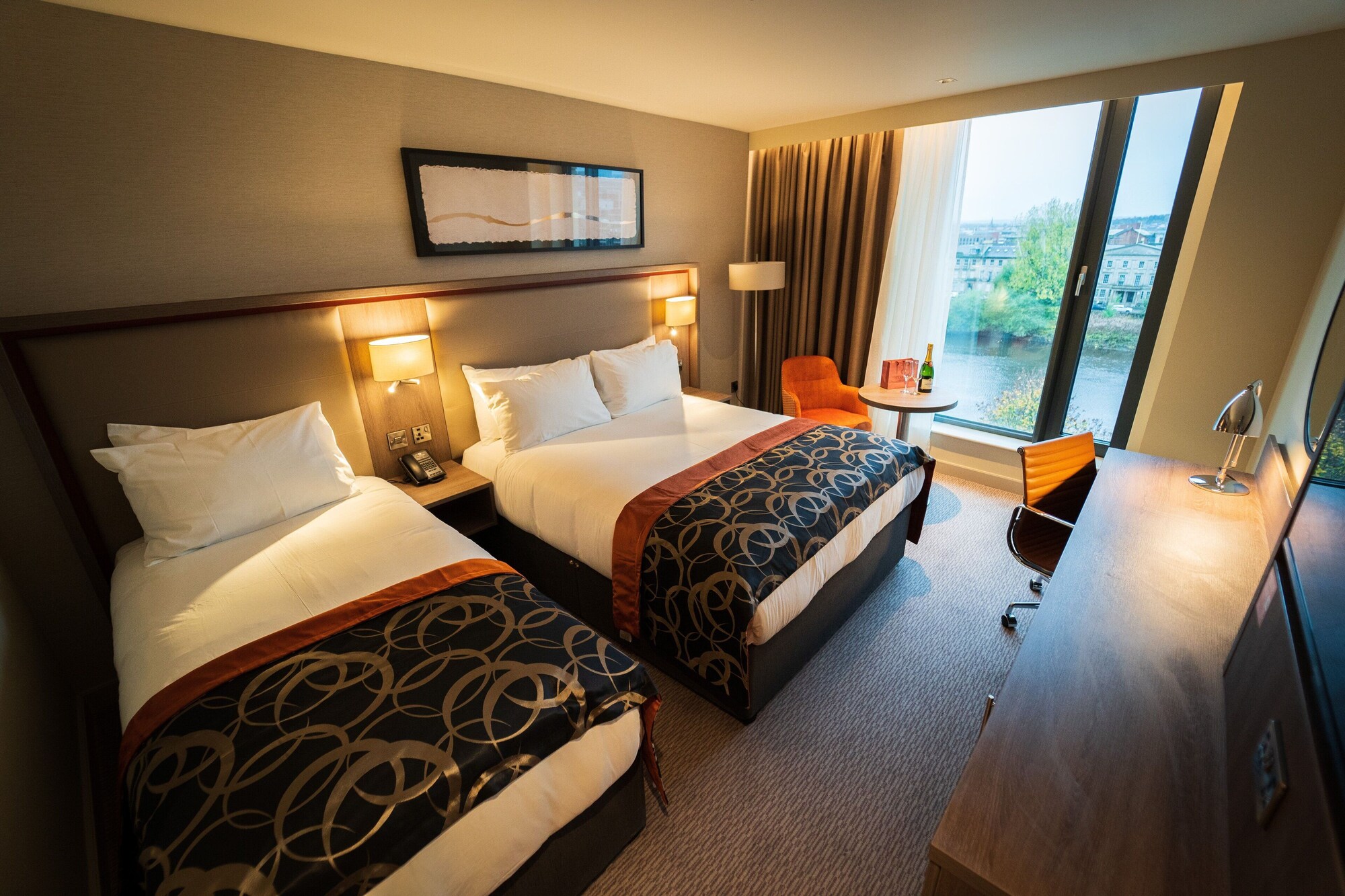 DELUXE, 1 DOUBLE AND 1 SINGLE BED