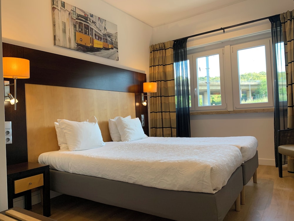 غرفة سوبيريور بسريرين منفصلين بحمام خاص في الطابق الأرضي، Discovery Apartment Benfica 4/10