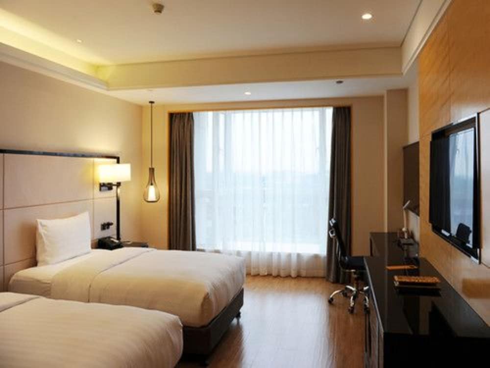 Pullman Qingdao Ziyue 18/66