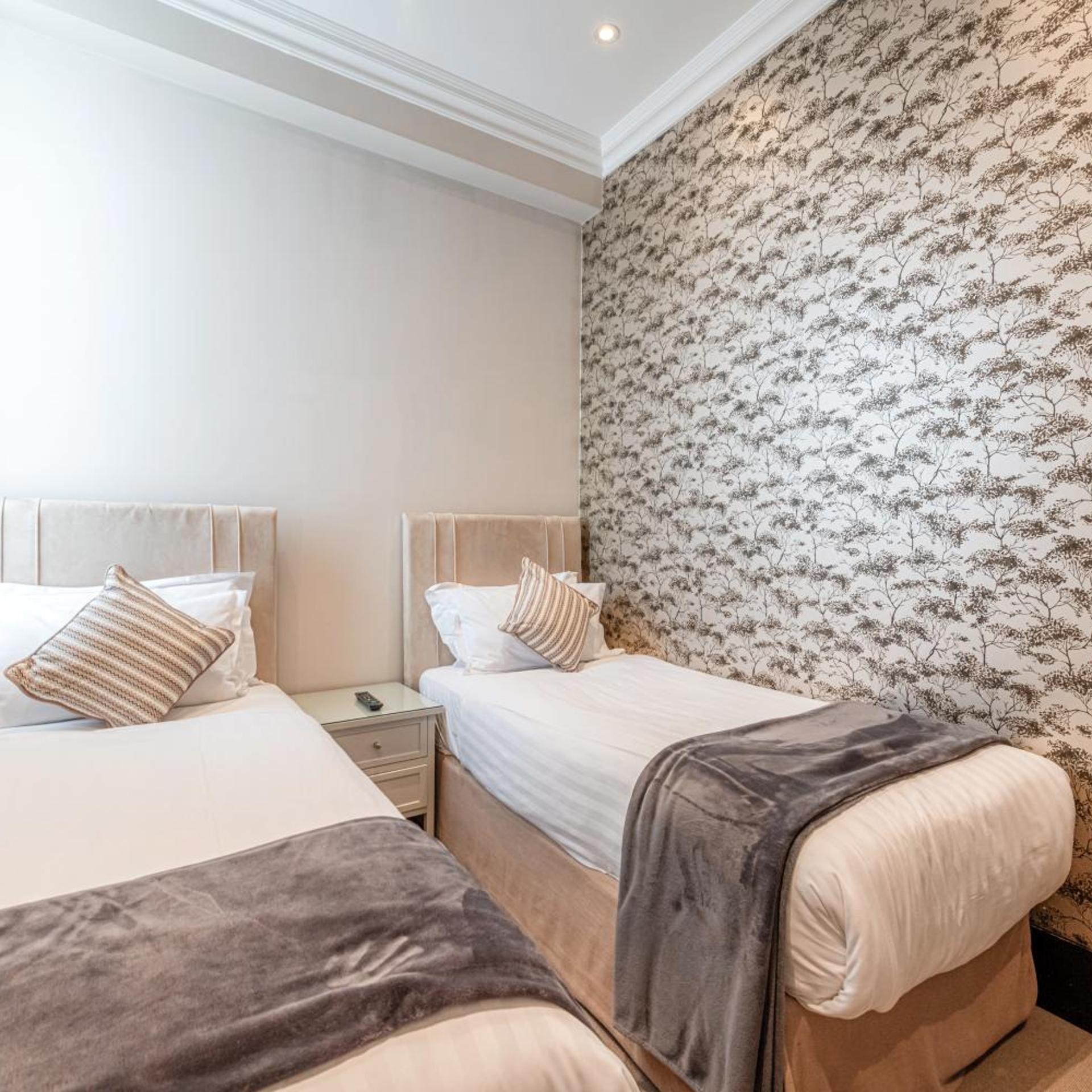 شقة ديلوكس بسرير كينج بغرفتي نوم، 130 Queensgate Apartments 4/10