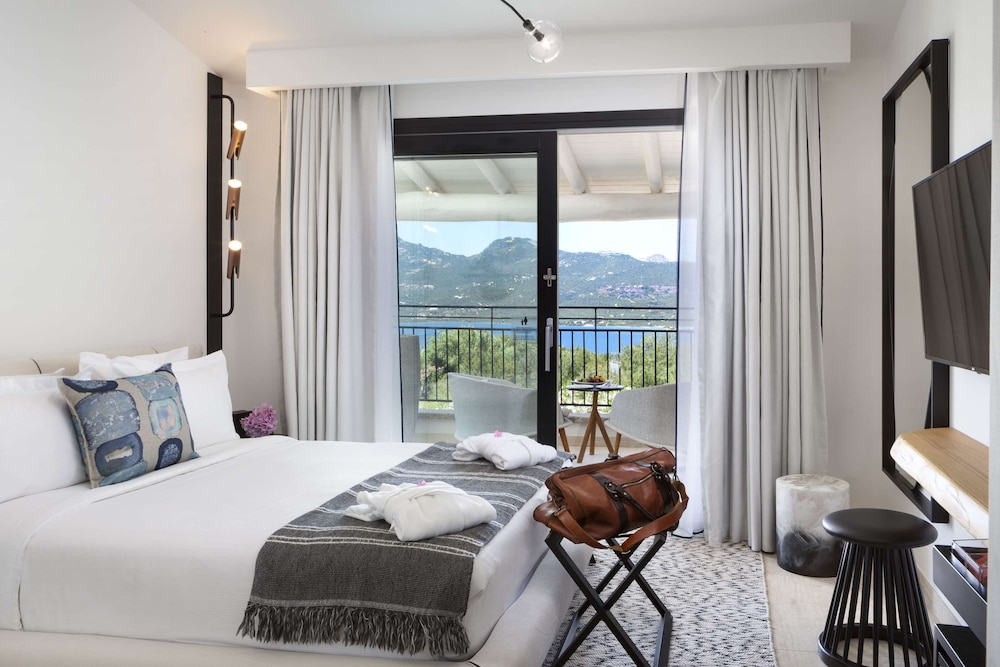 Sulia House Porto Rotondo, Curio Collection by Hilton 29/99