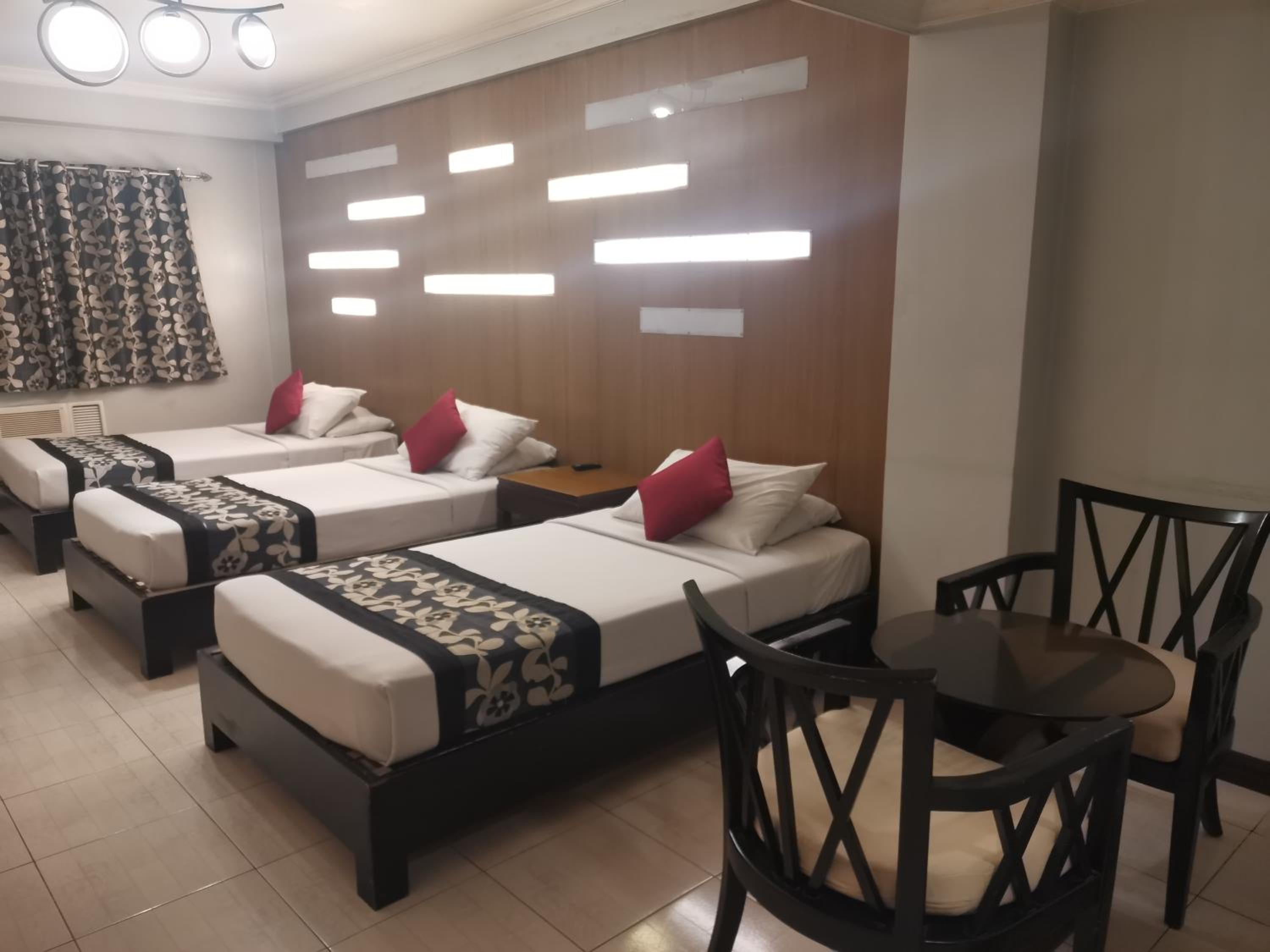 غرفة قياسية ثلاثية، Jupiter Suites 7/10