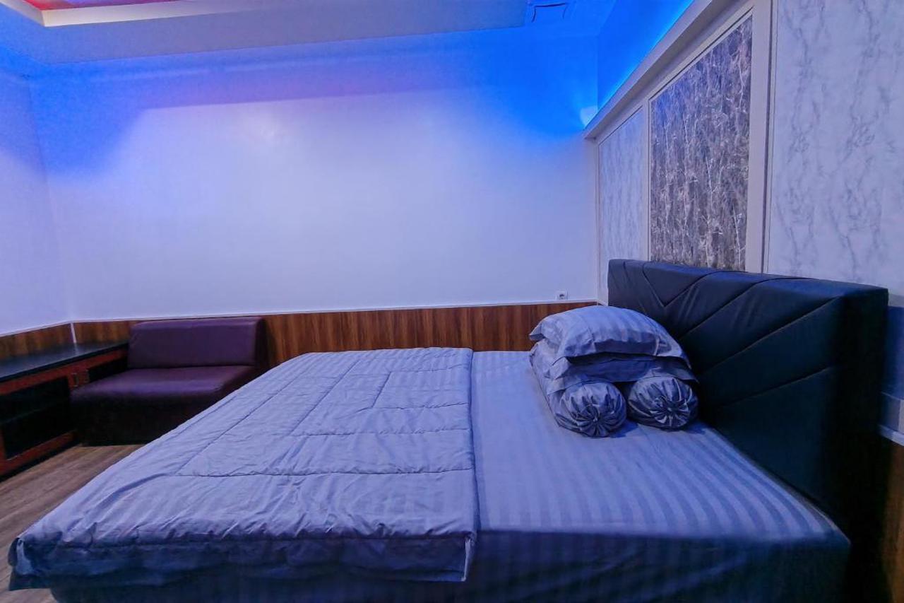 Hotel O near Palangka Raya Mall formerly Wisma Esun Bue Palangkaraya 13/26