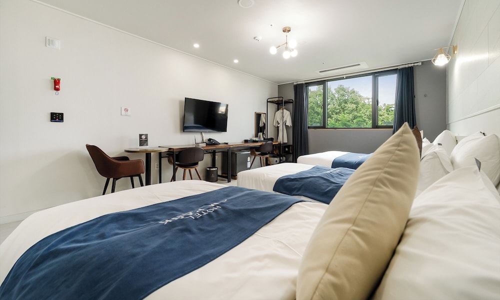 غرفة سوبيريور ثلاثية بسرير مزدوج وسريرين منفصلين، Andong Cm Park Hotel 2/10