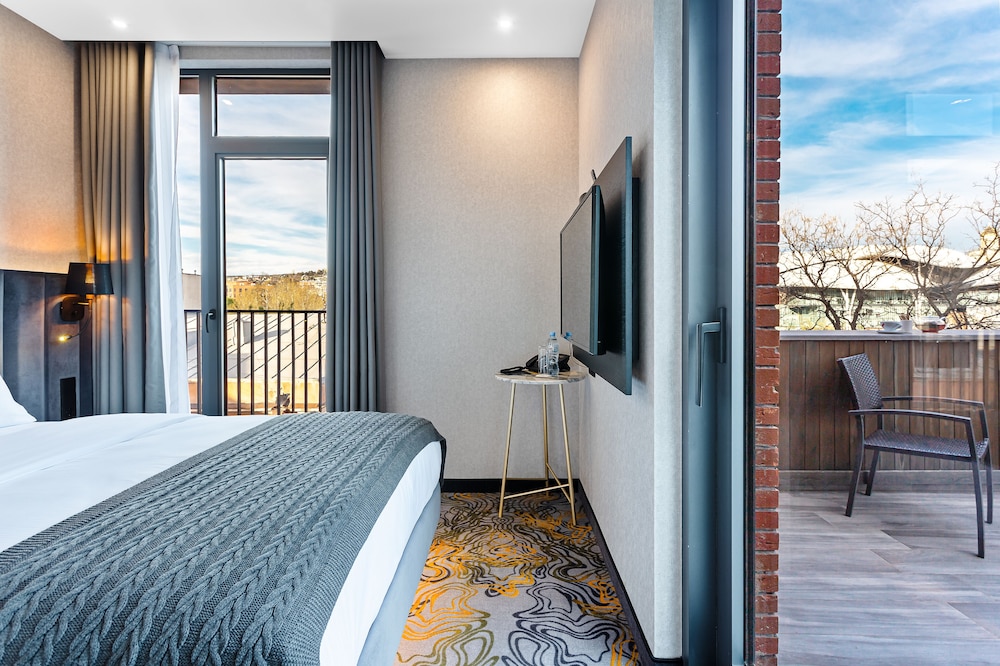 Taberne Boutique Hotel 32/65