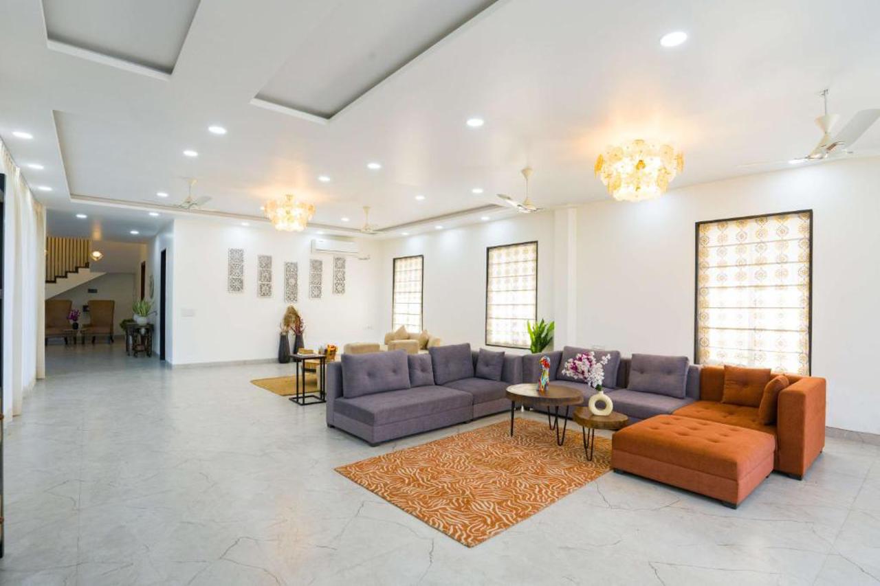 ELIVAAS AdhiVa Retreat 5 BHK Farmhouse with Pvt Pool, Bar & Lush Garden 9/15