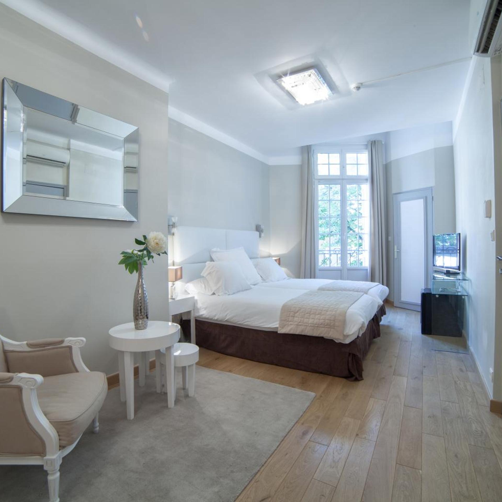 جناح بسرير مزدوج أو سريرين منفصلين، HOTEL DE FRANCE 5/10