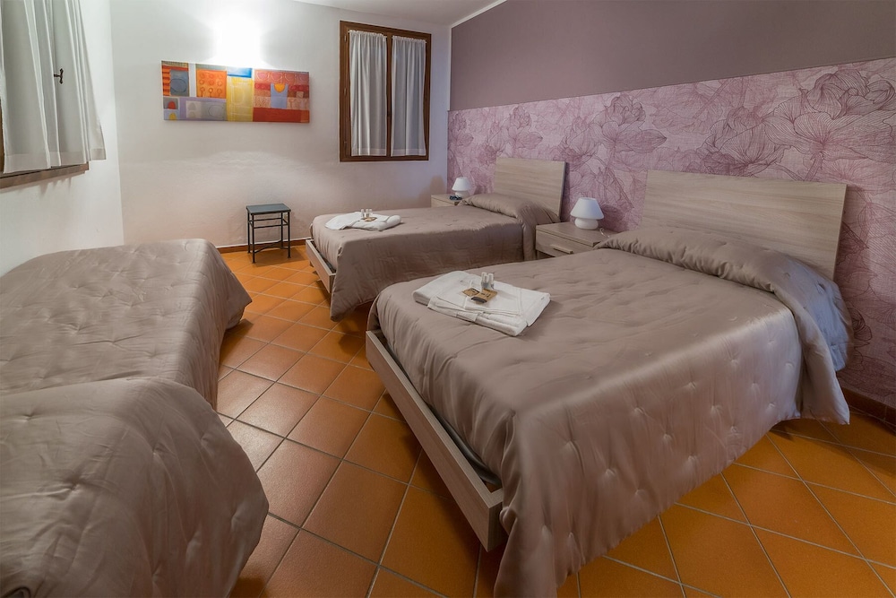 Family, 1 Double and 3 Single Beds