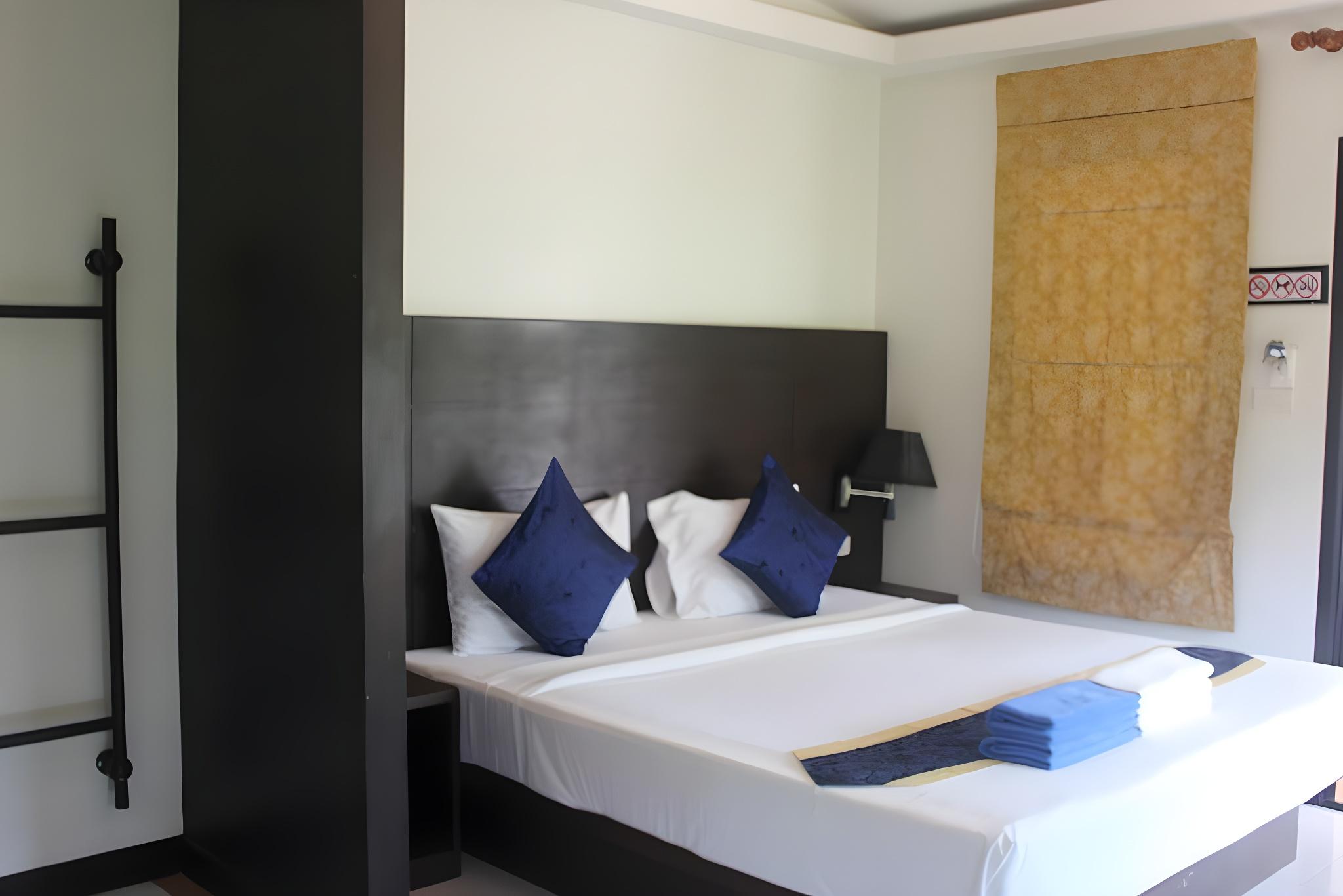 غرفة قياسية بسرير كوين بإطلالة على الحديقة، Golden Bay Cottage 2/2