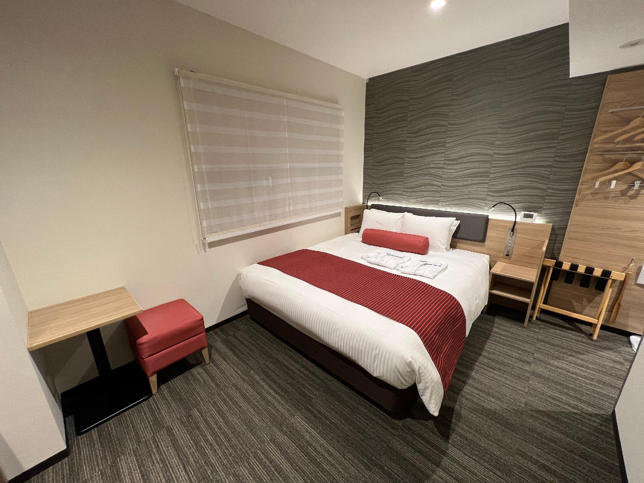 غرفة تنفيذية بسرير مزدوج