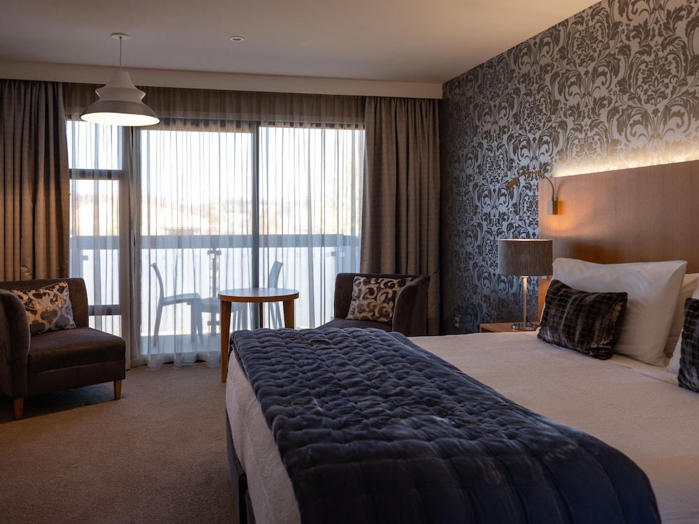 غرفة بريميير بسرير كينج، Porters Boutique Hotel 5/6