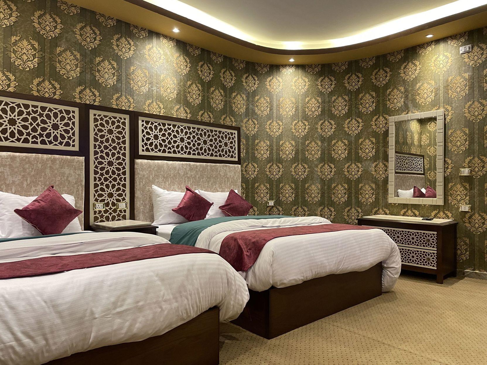 غرفة ديلوكس ثلاثية بإطلالة على المدينة بغرفتي نوم، CAIRO INN 2/2
