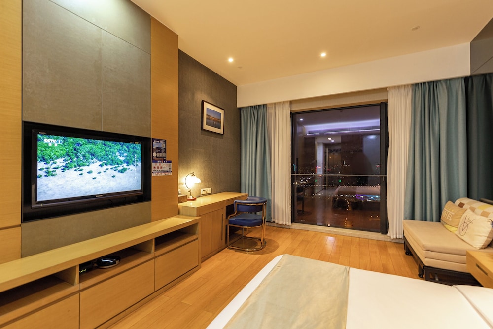Xingyi International Hotel Poly Store 52/70