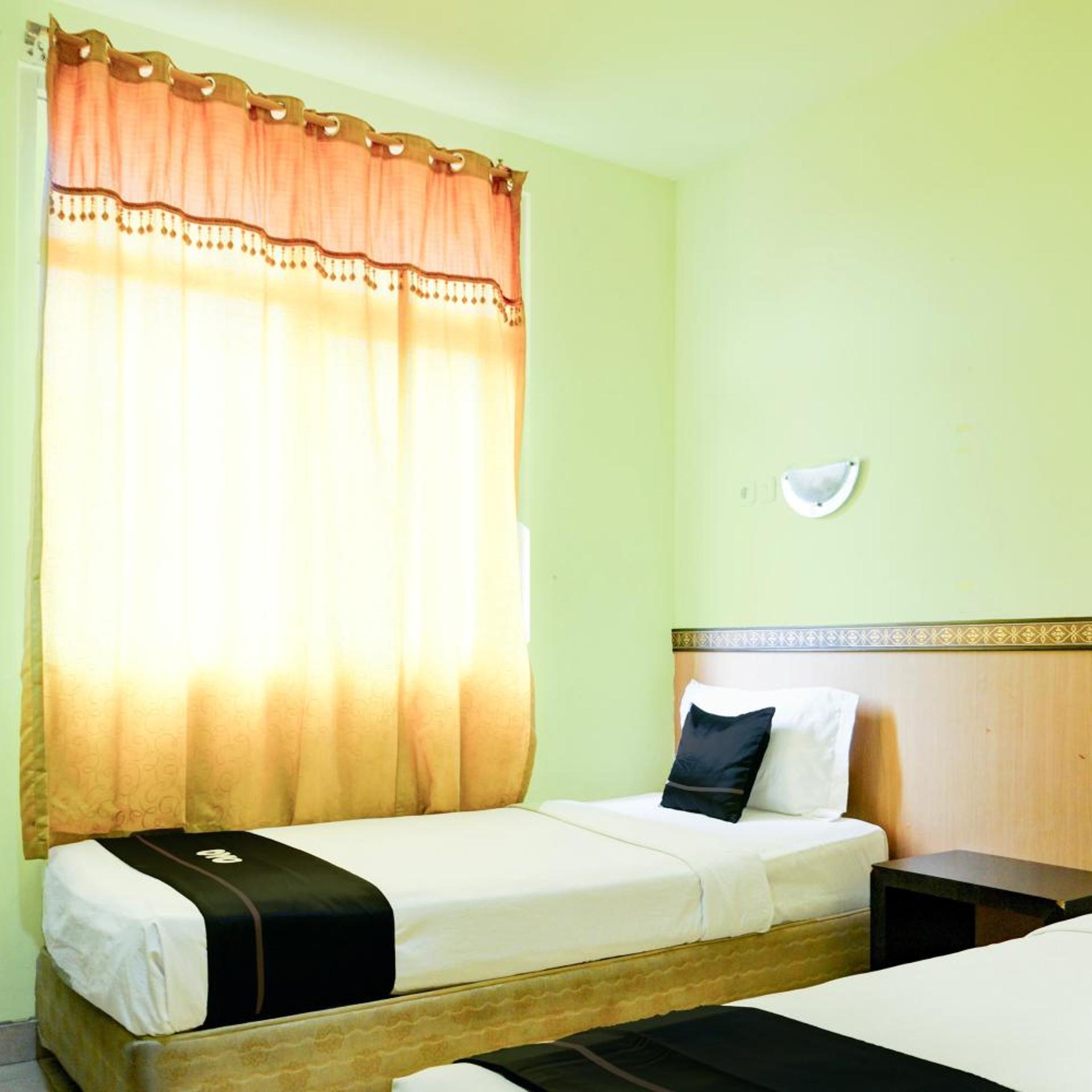 غرفة قياسية بسريرين منفصلين، OYO 2255 Hotel Aifih 6/9