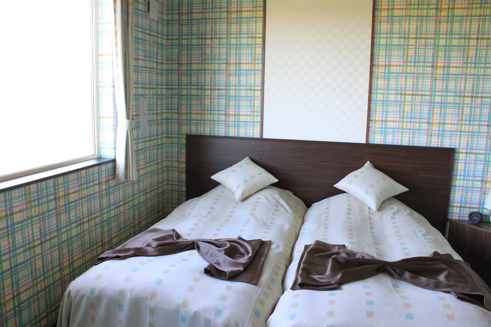 Petit Hotel Blanc Fleur 26/49