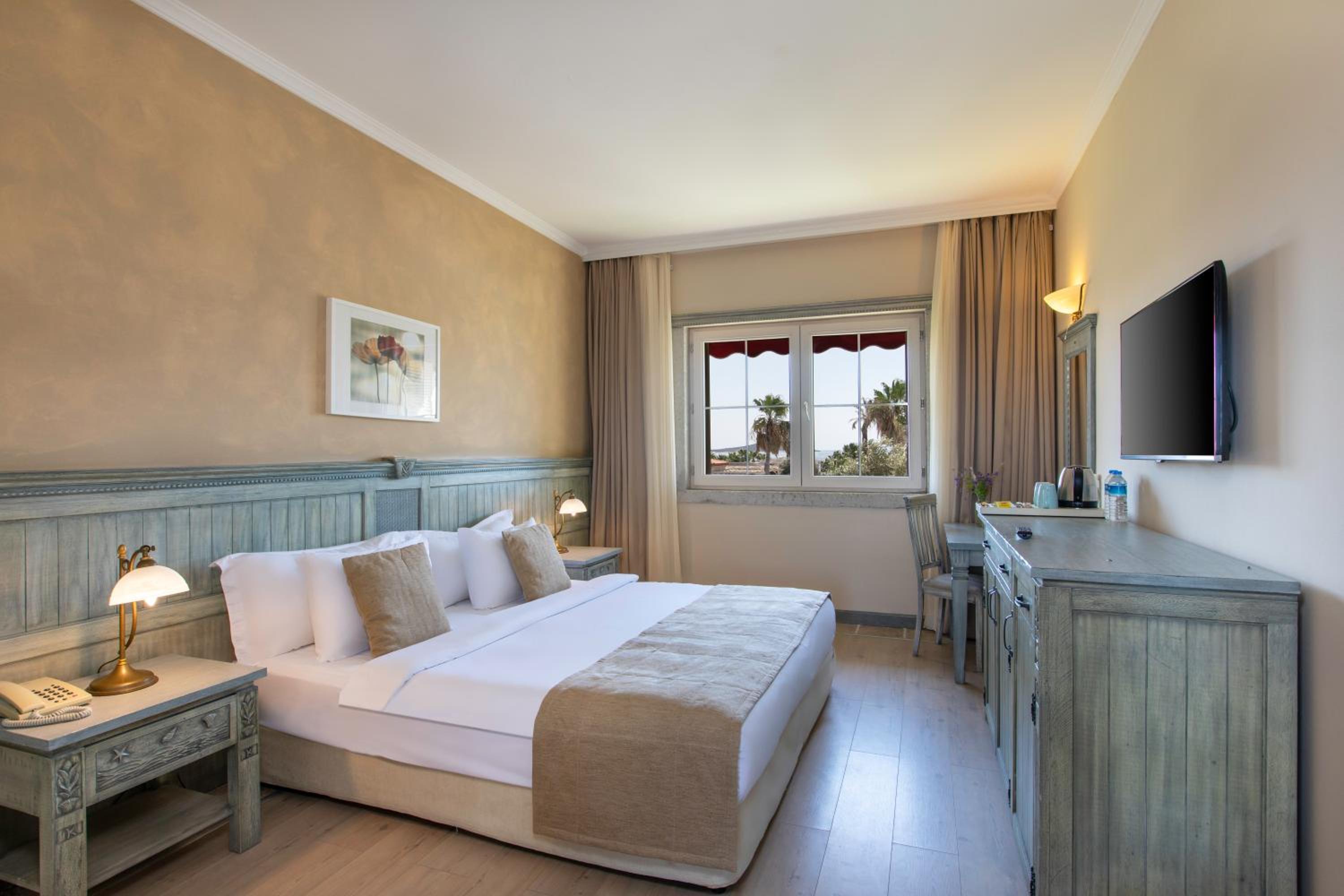 غرفة ديلوكس بسرير مزدوج أو سريرين منفصلين بإطلالة على الحديقة، Alacati Beach Resort 3/5