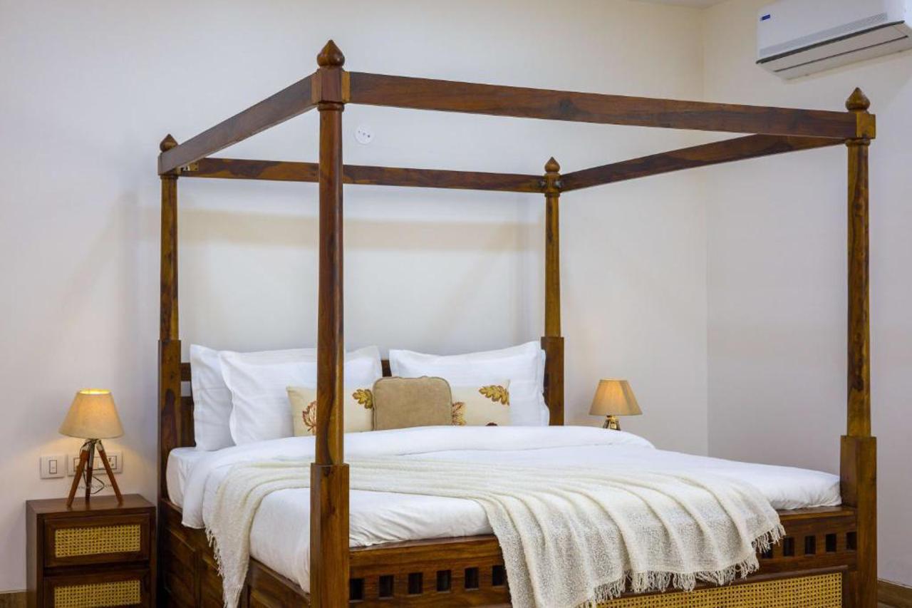ELIVAAS AdhiVa Retreat 5 BHK Farmhouse with Pvt Pool, Bar & Lush Garden 7/15