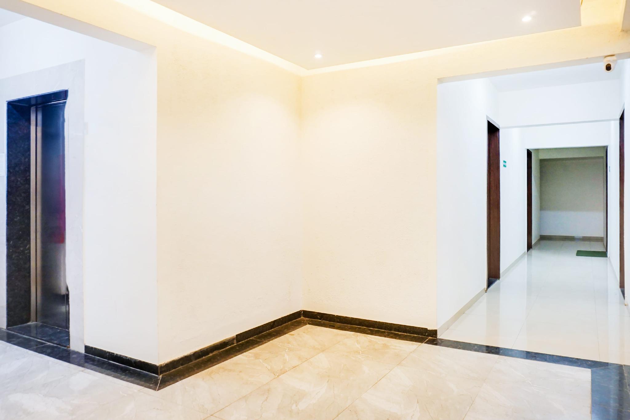 Super Townhouse Lohegaon Near Pune Airport formerly Landmark Regency 23/29