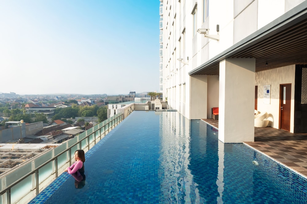 Swiss Belinn Manyar 69/75