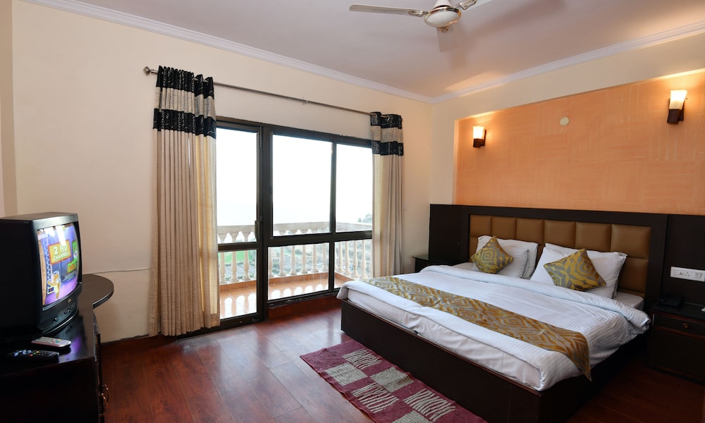 جناح تنفيذي بسرير مزدوج بغرفة نوم واحدة، Dynasty Resort, Khurpatal 3/7