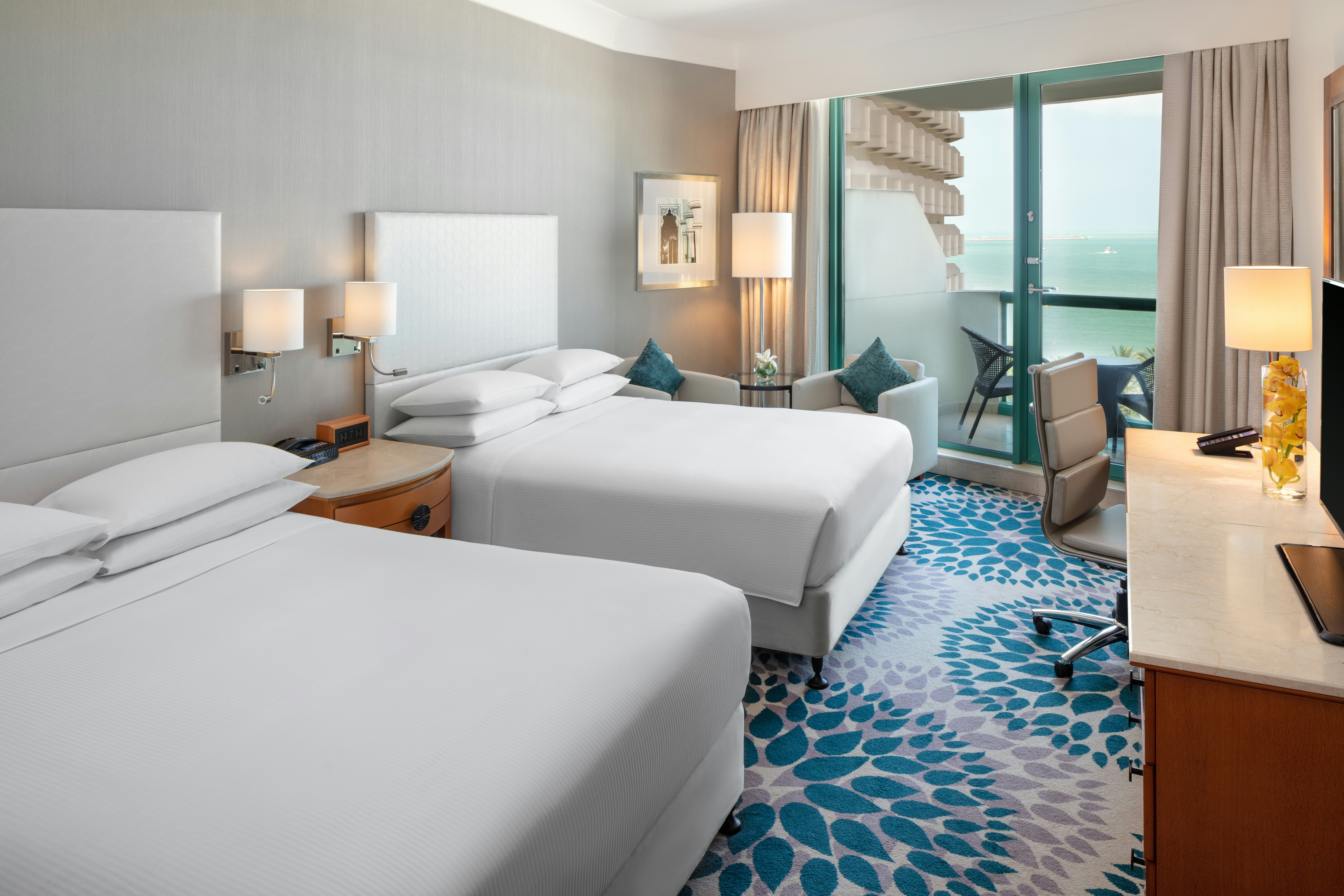 room, 2 queen beds, partial sea view