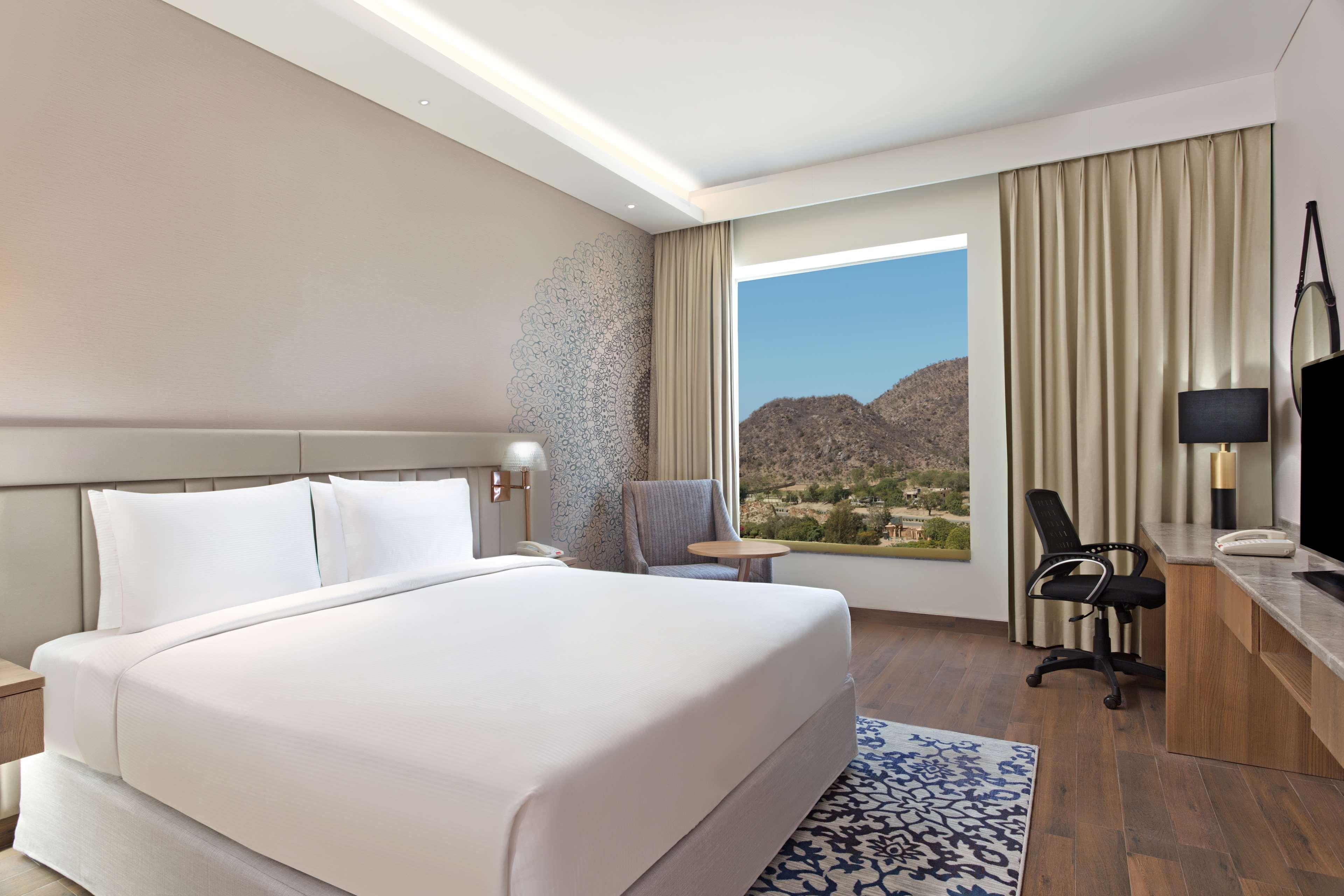 GUEST ROOM, KING BED, ARAVALLI VIEW