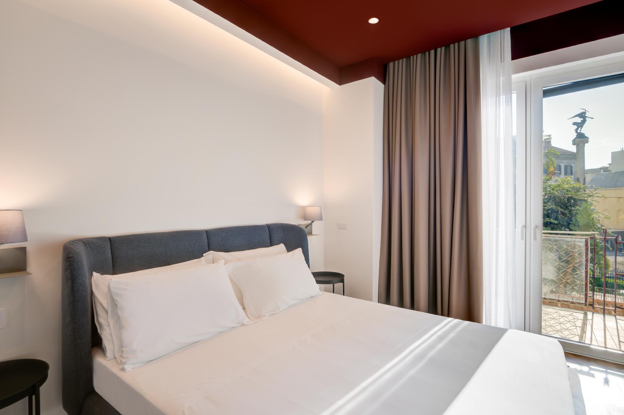 Well Suites - Piazza dei Martiri 7/18