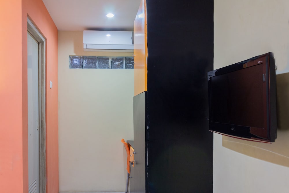 Oyo 989 Audah Guesthouse Syariah 18/36