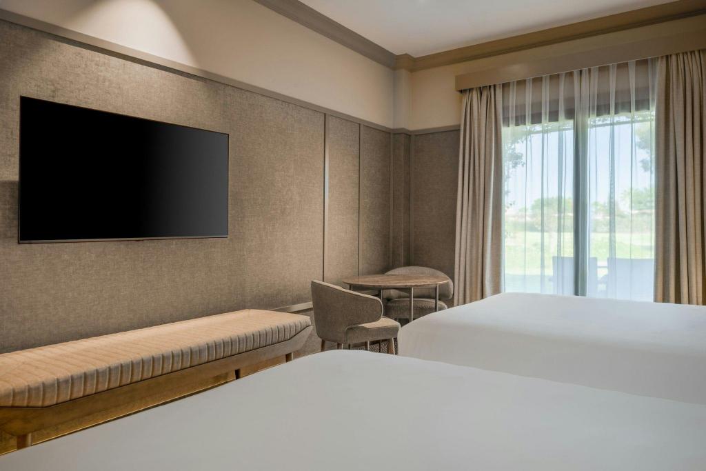 Guest Room, Deluxe, 2 Queen Beds, Garden View, Terrace, Priority Location