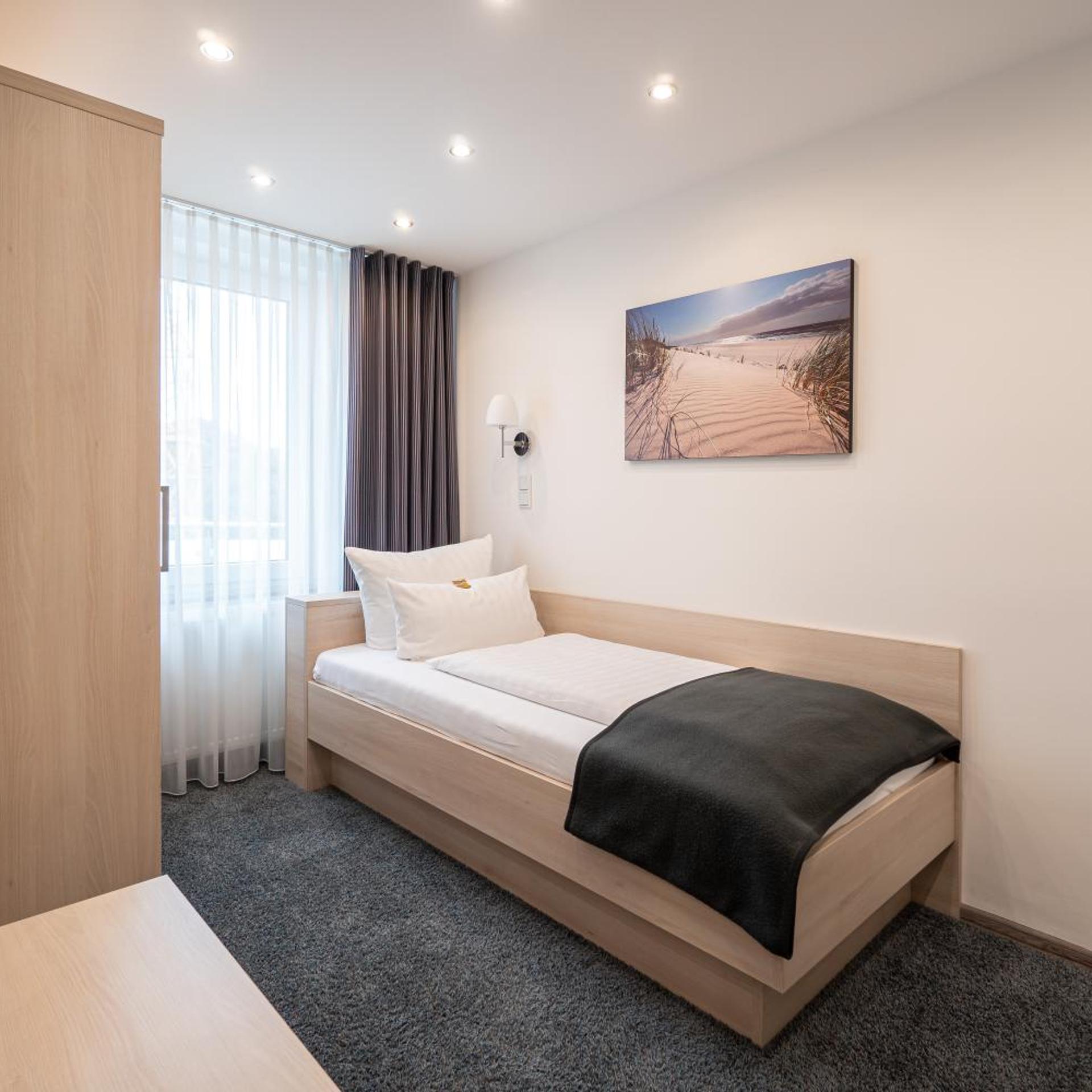 غرفة سوبيريور ثلاثية بسرير فردي، Hotel Deutscher Hof 2/5