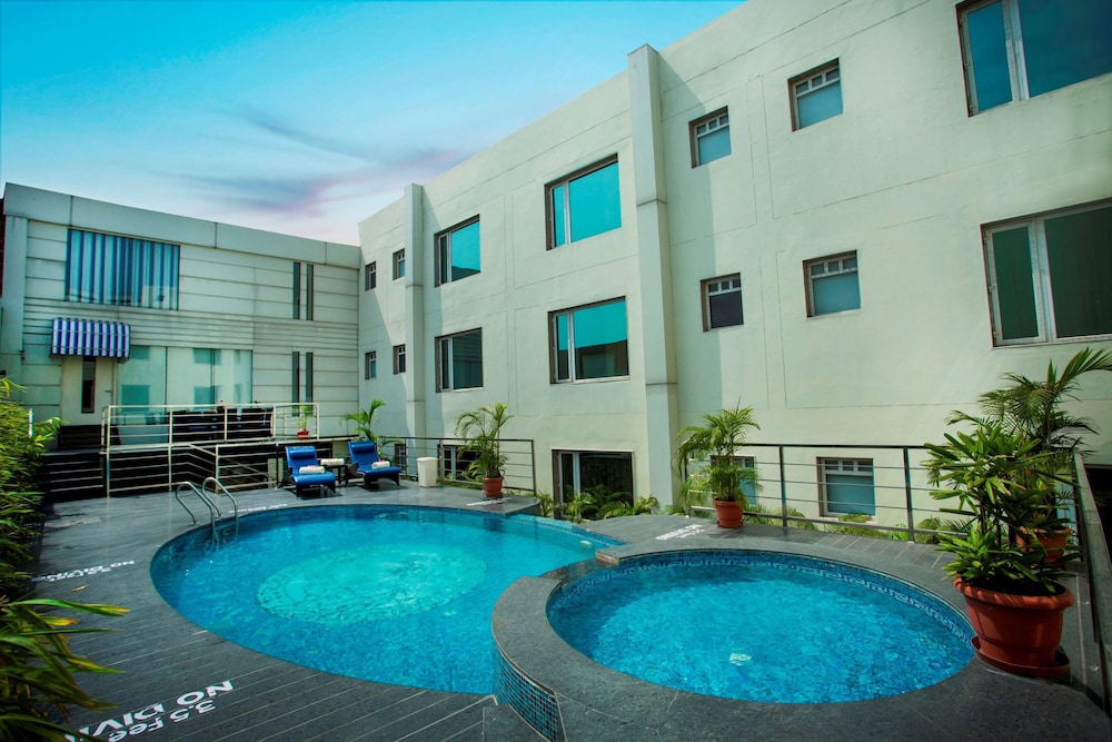 Sarovar Portico 49/50