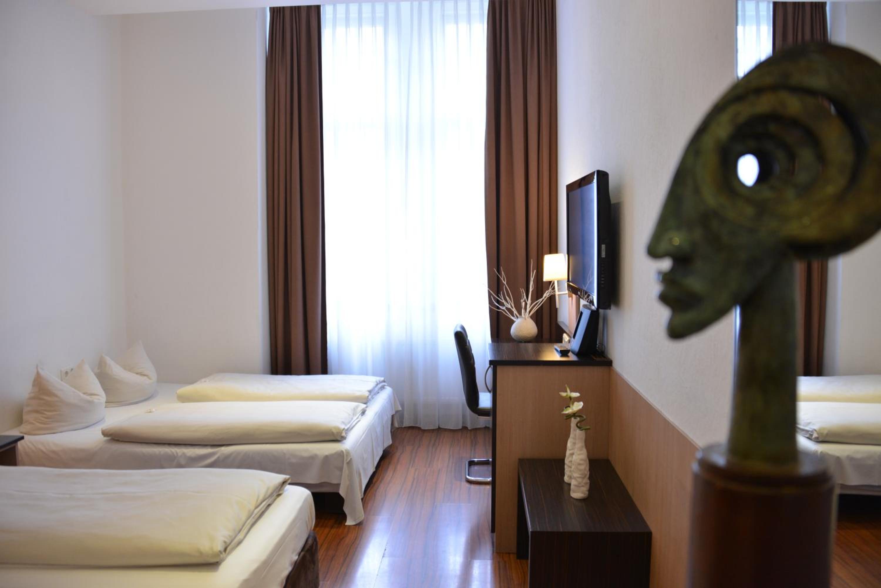 غرفة رباعية بسرير فردي، Arthotel Munich 9/10