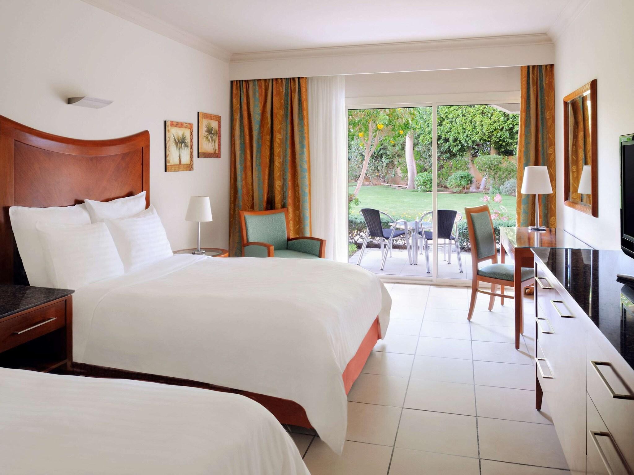 غرفة تنفيذية بسريرين كوين
