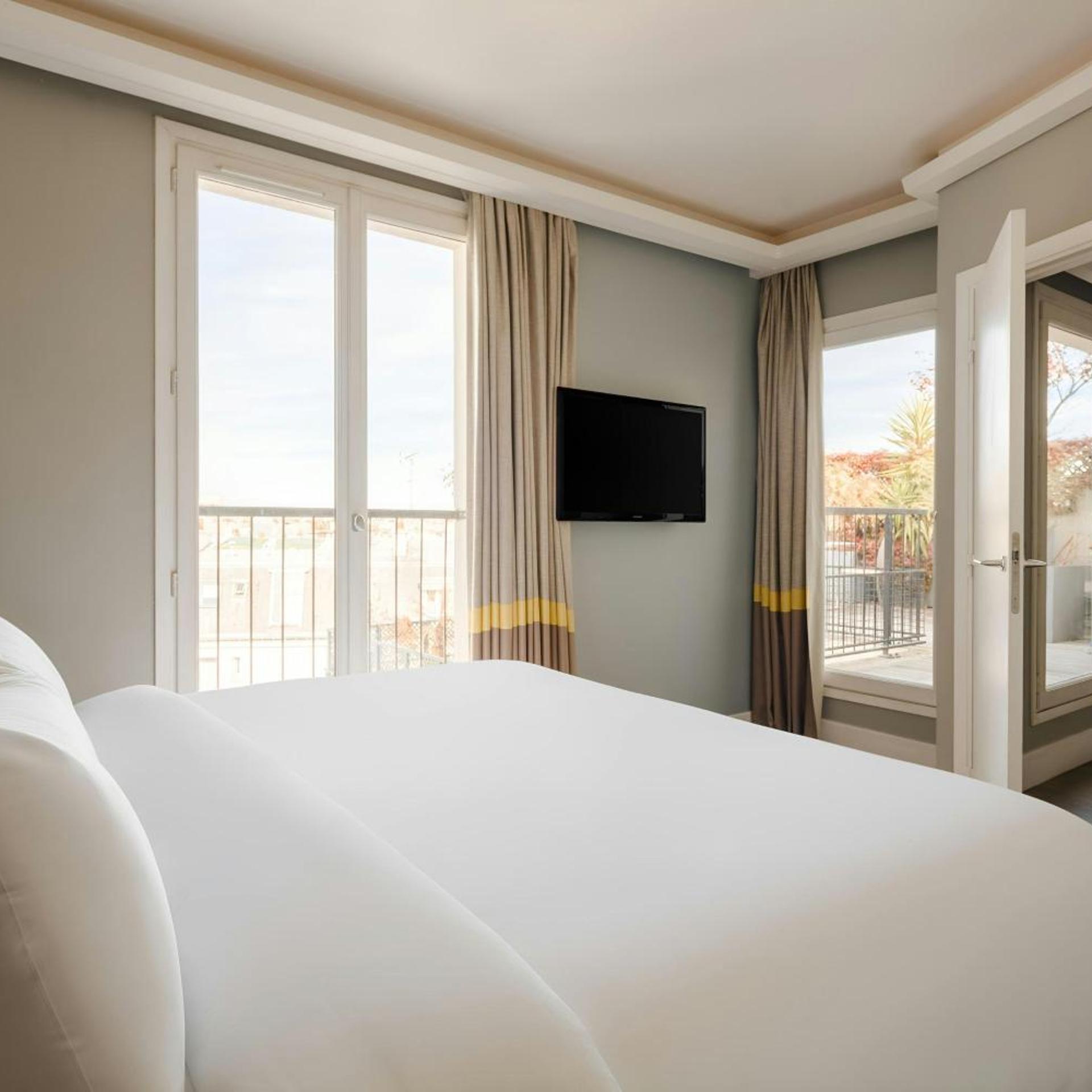 جناح بسرير كينج بشرفة بمطبخ صغير، L Edmond Hotel Parc Monceau 4/6