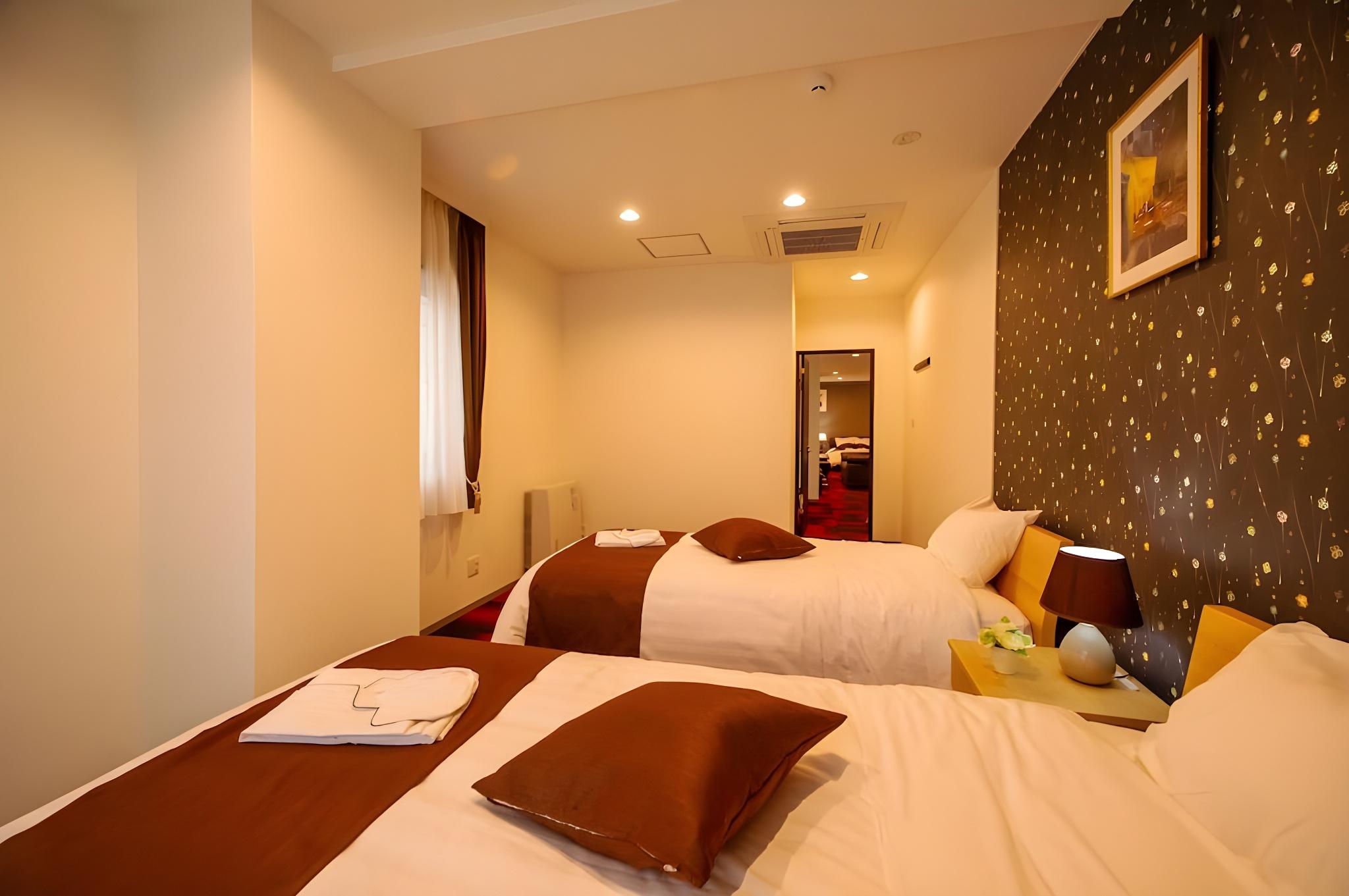 Suite, 1 Double and 3 Single Beds, with Extra Bed