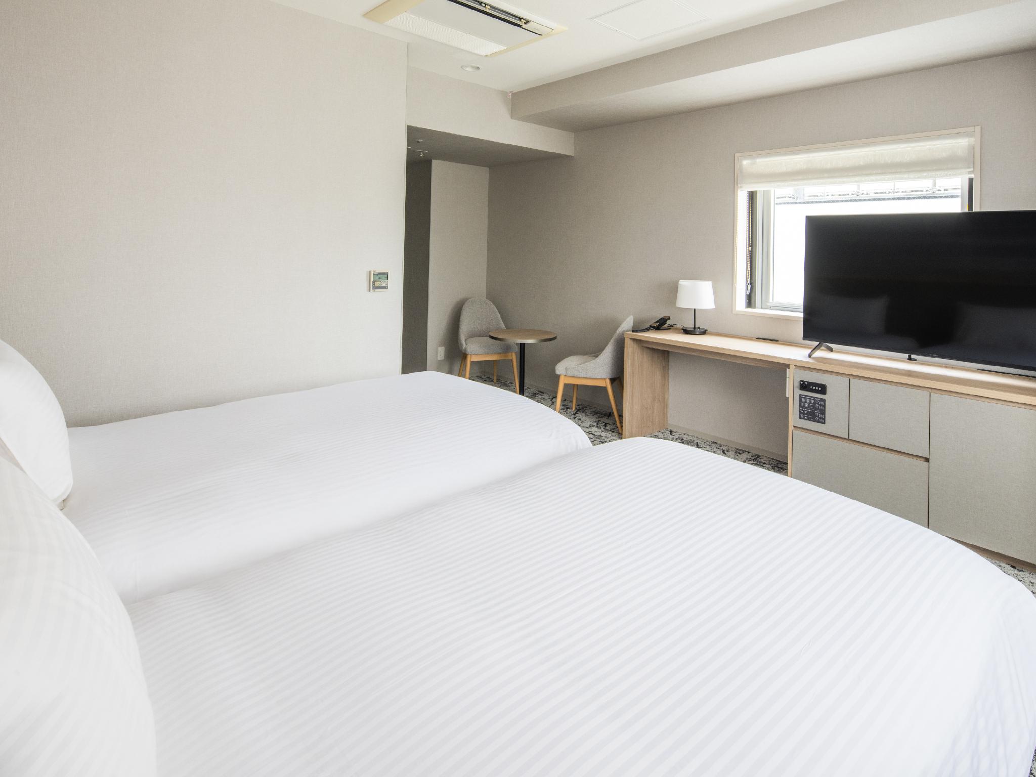 Deluxe Corner Twin Room