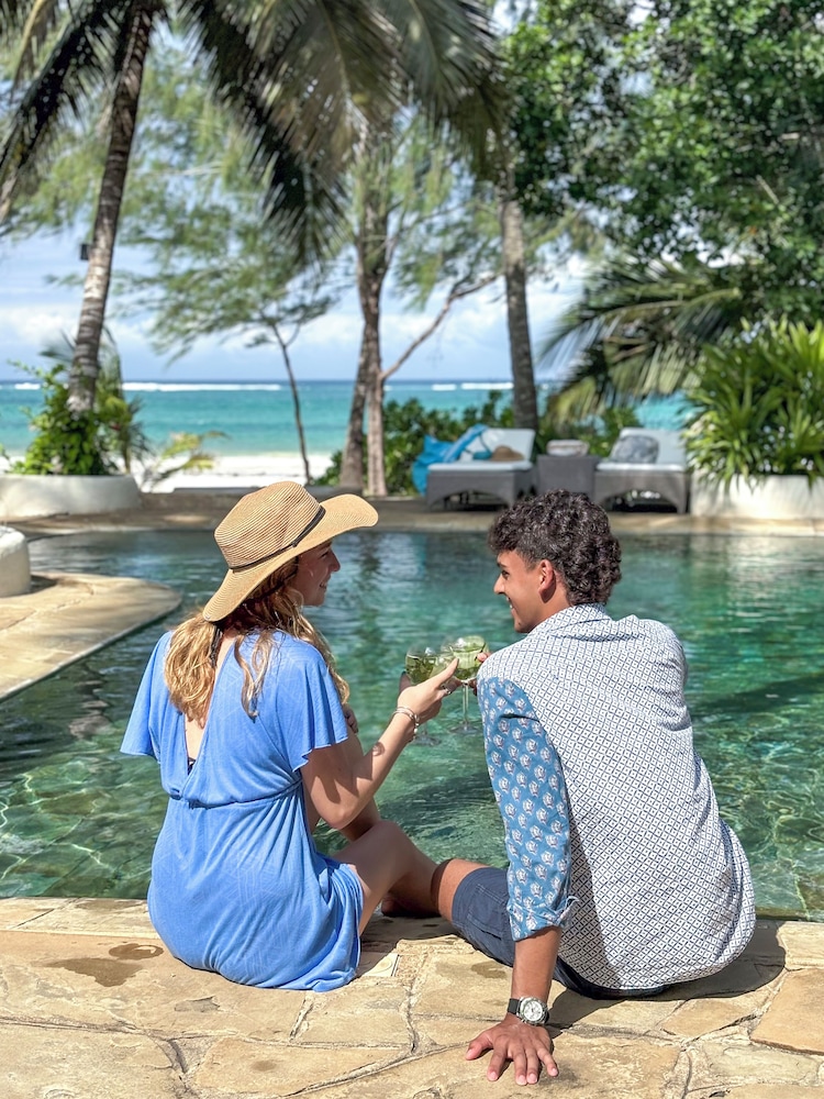 Nomad Beach Resort 69/76