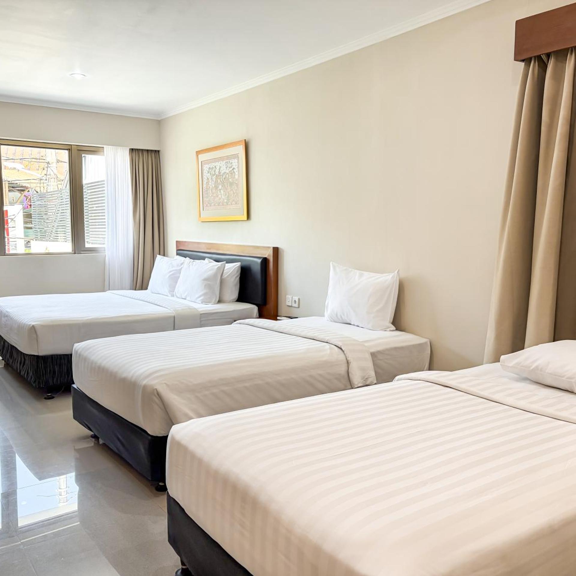 غرفة عائلية بسرير فردي، Svarna Hotel Sanur 4/7
