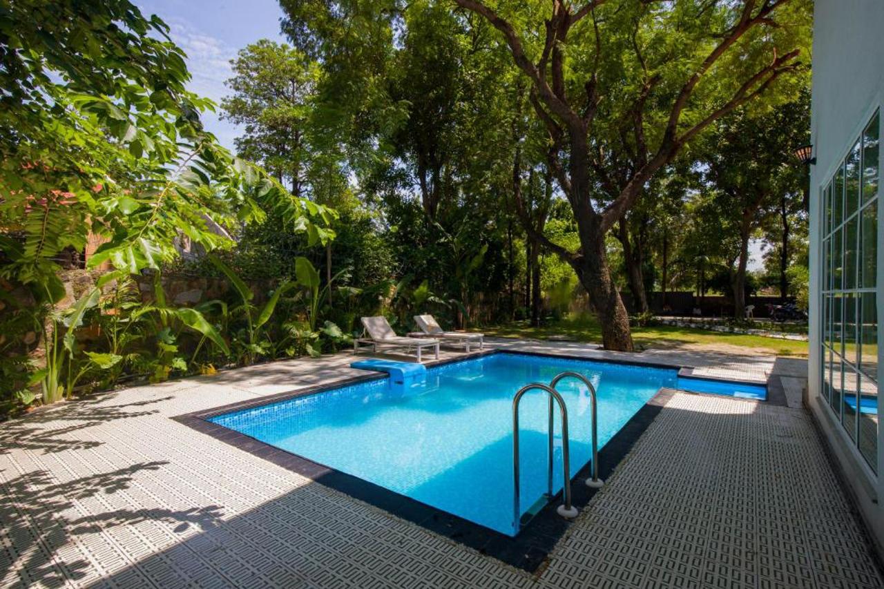 ELIVAAS Varsha Greens A 4-BHK Retreat with Private Pool & Outdoor Patios 16/20