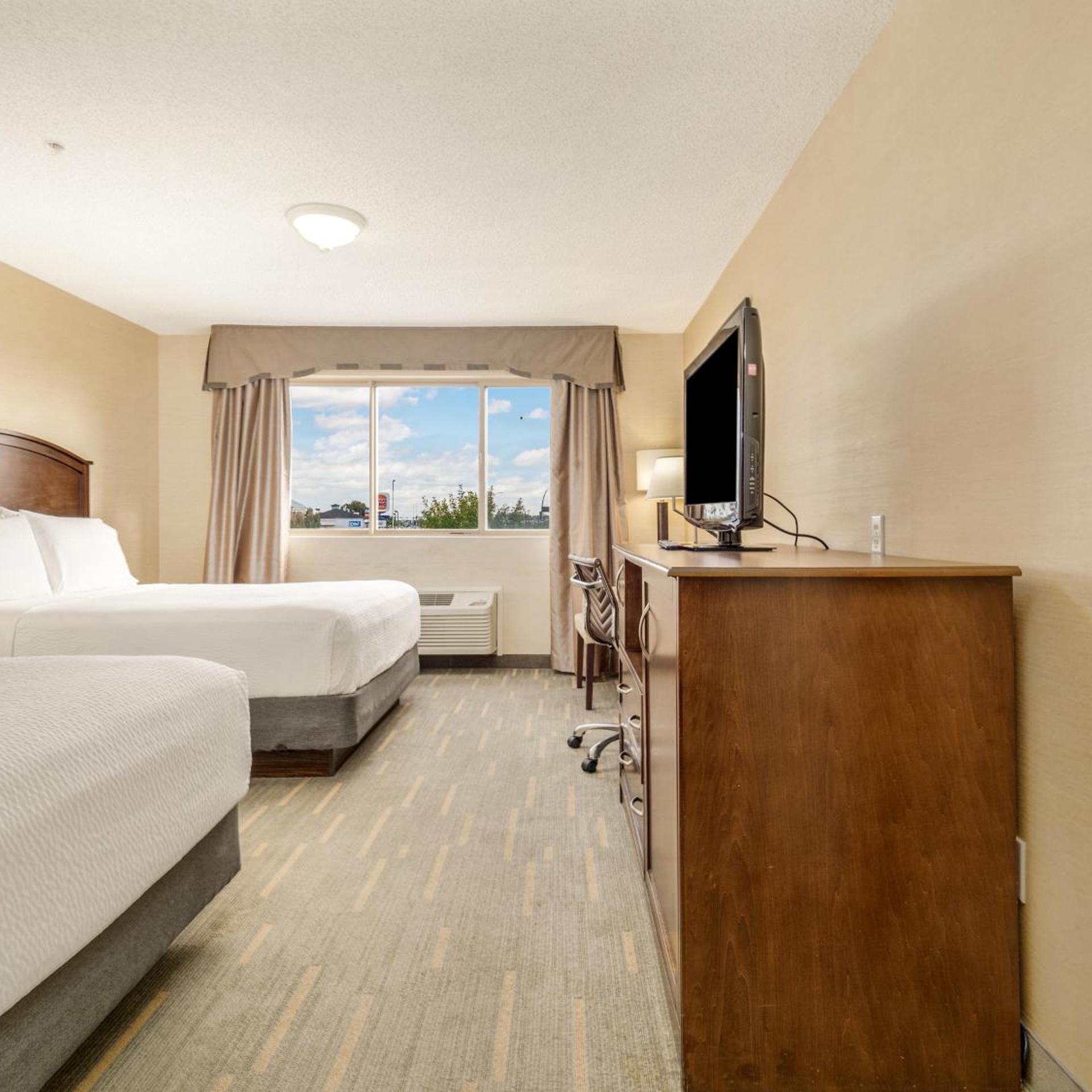 غرفة تنفيذية بسريرين كوين بغرفة نوم واحدة، HOLIDAY INN LETHBRIDGE 2/6