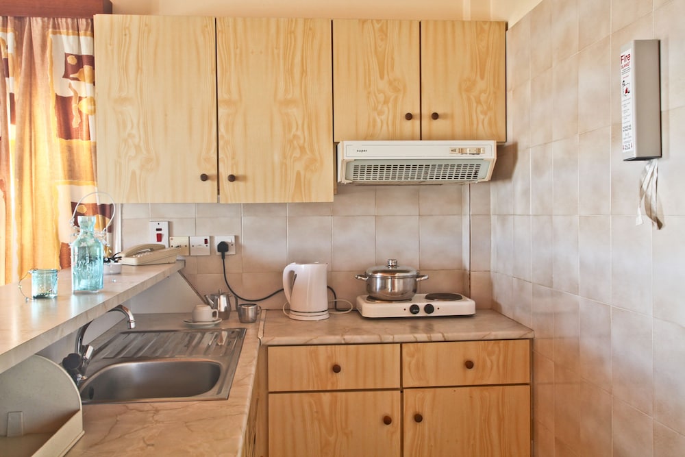 Windmills Hotel Apartments 61/61