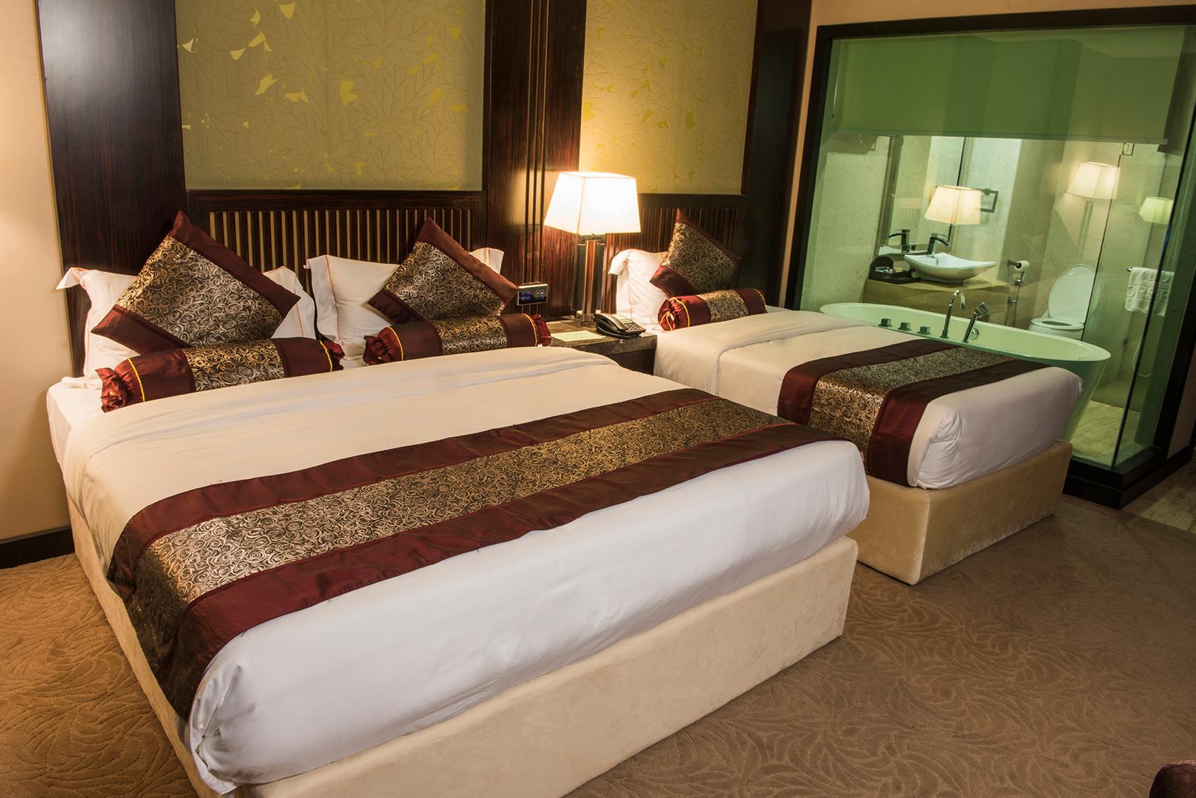 Super, Deluxe, Triple, 1 King and 1 Single Beds