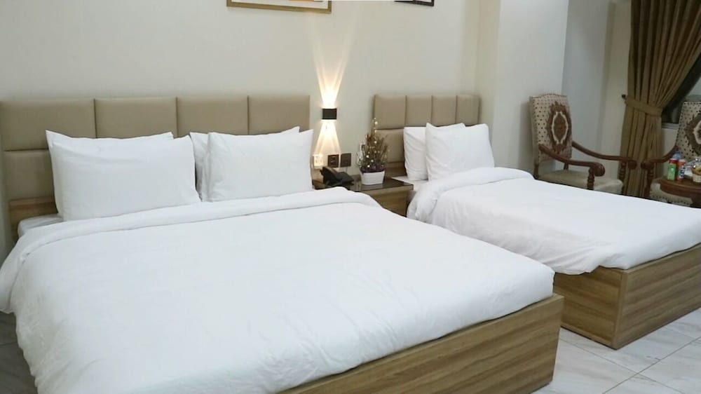 جناح ديلوكس بسرير كينج وسرير فردي، Hotel Pearl Inn 5/6