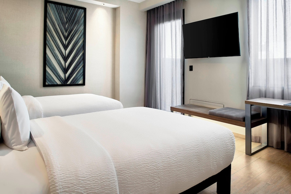 room, 2 double beds, city view