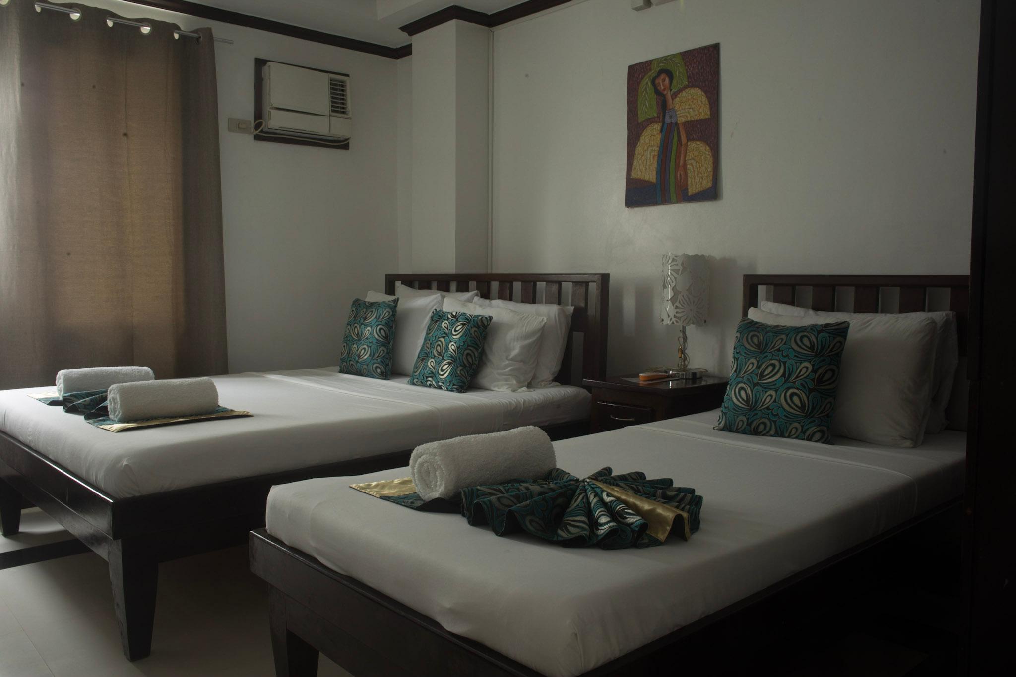 Super, Deluxe, 1 Double and 1 Single Bed