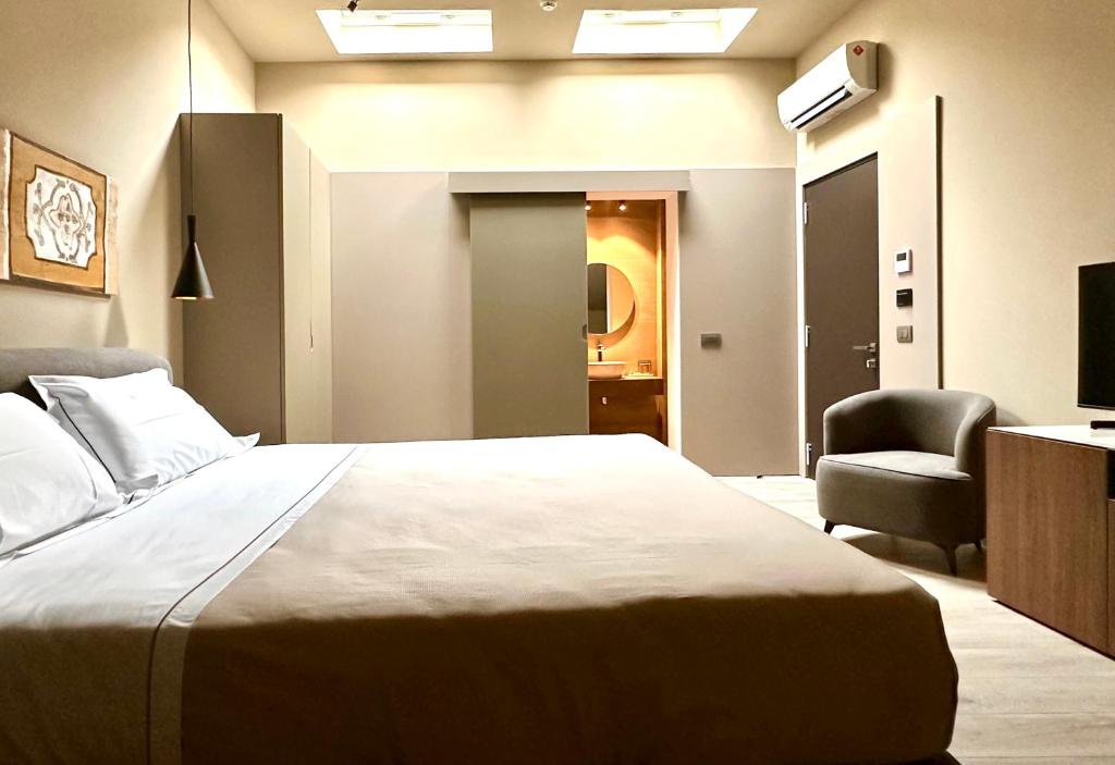 غرفة قياسية بسرير مزدوج أو سريرين منفصلين، Palazzo Liberty Unique Hotel 2/4