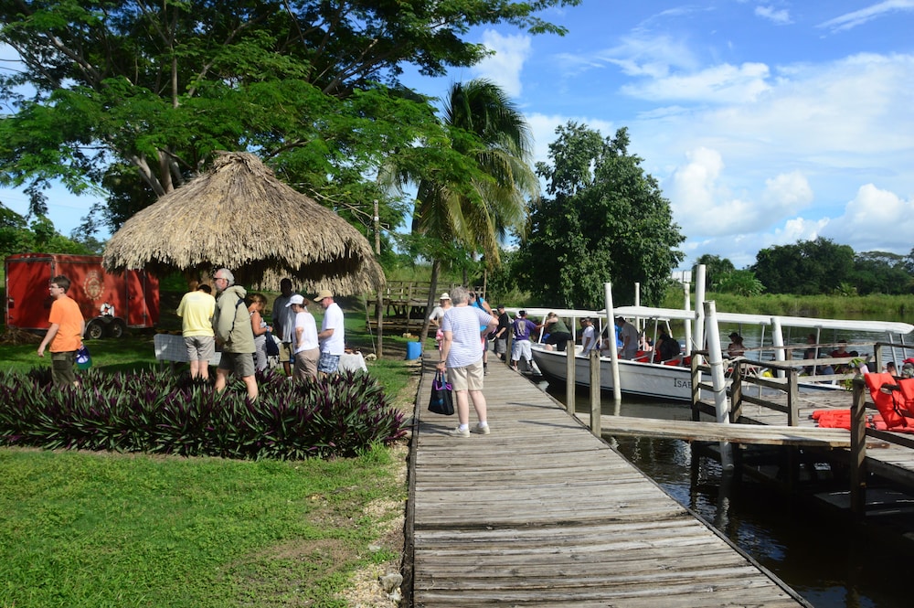 LAMANAI LANDINGS HOTEL AND MARINA 70/76
