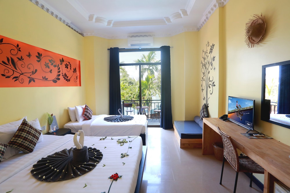 غرفة ديلوكس عائلية بسرير كينج وسرير فردي بشرفة، Central Indochine D Angkor Hotel 5/10