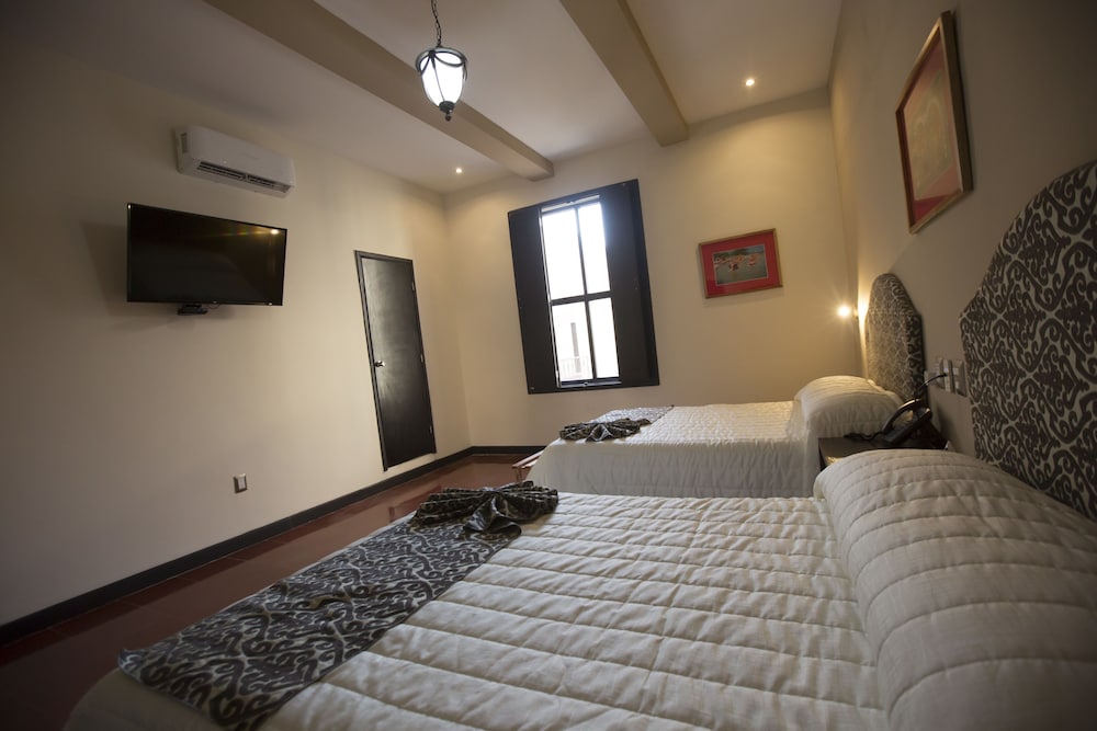 Hotel Merida 25/70